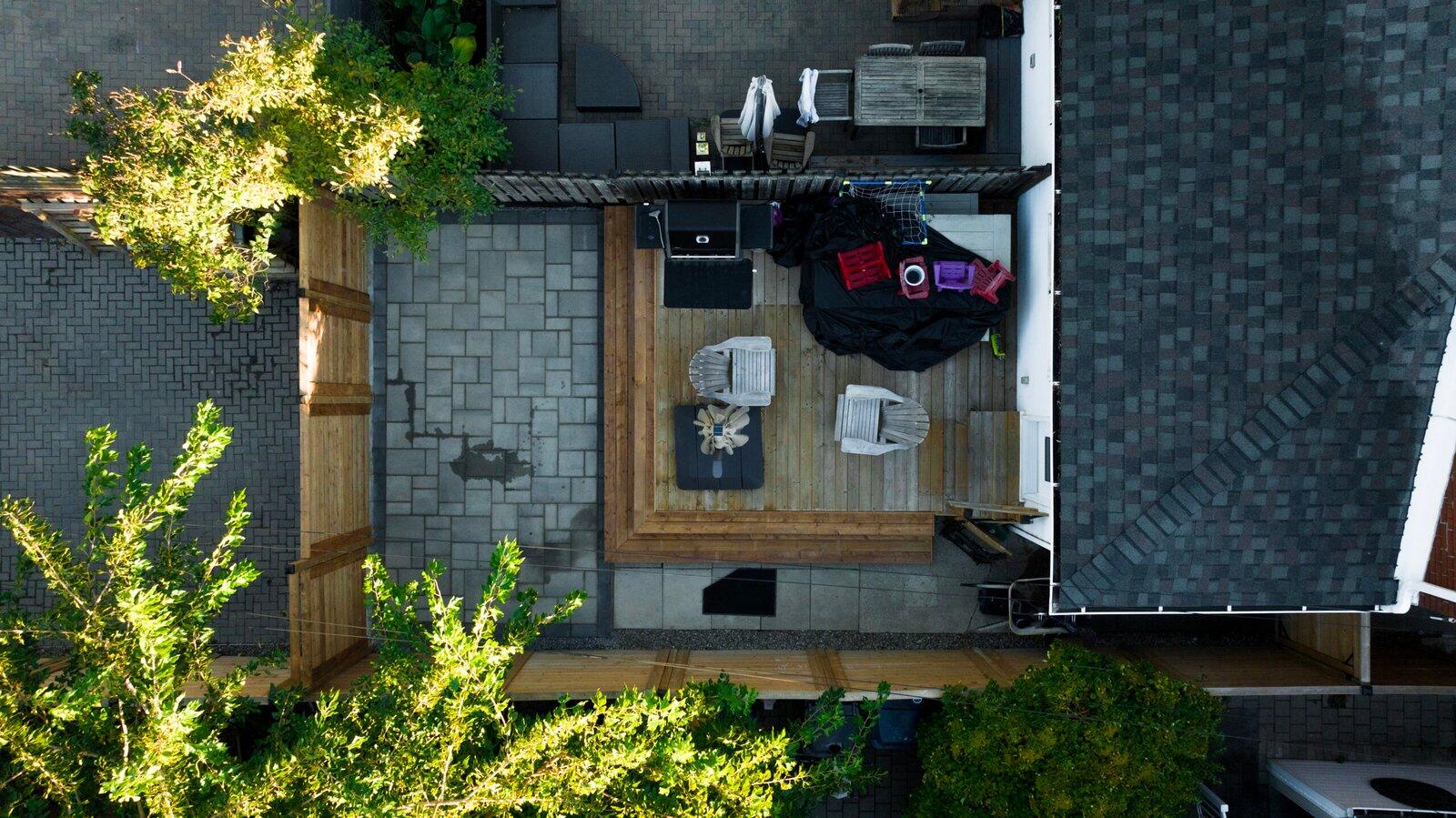Deck, fence, and interlock patio in The Junction