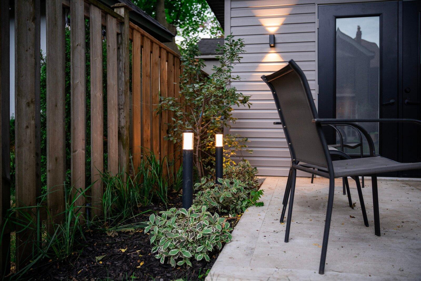 Architectural landscape lighting in a Toronto backyard